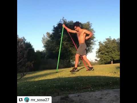 Outdoor stretching exercise using WODFitters resistance band