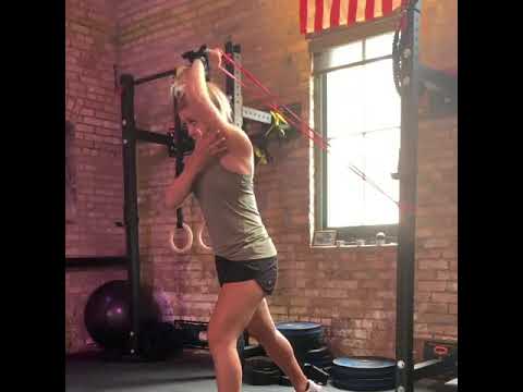 WODFitters Resistance Bands using for One arm tripes overhead Exercise